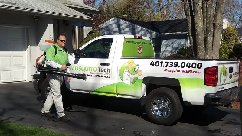 Mosquito Tech technician with company truck